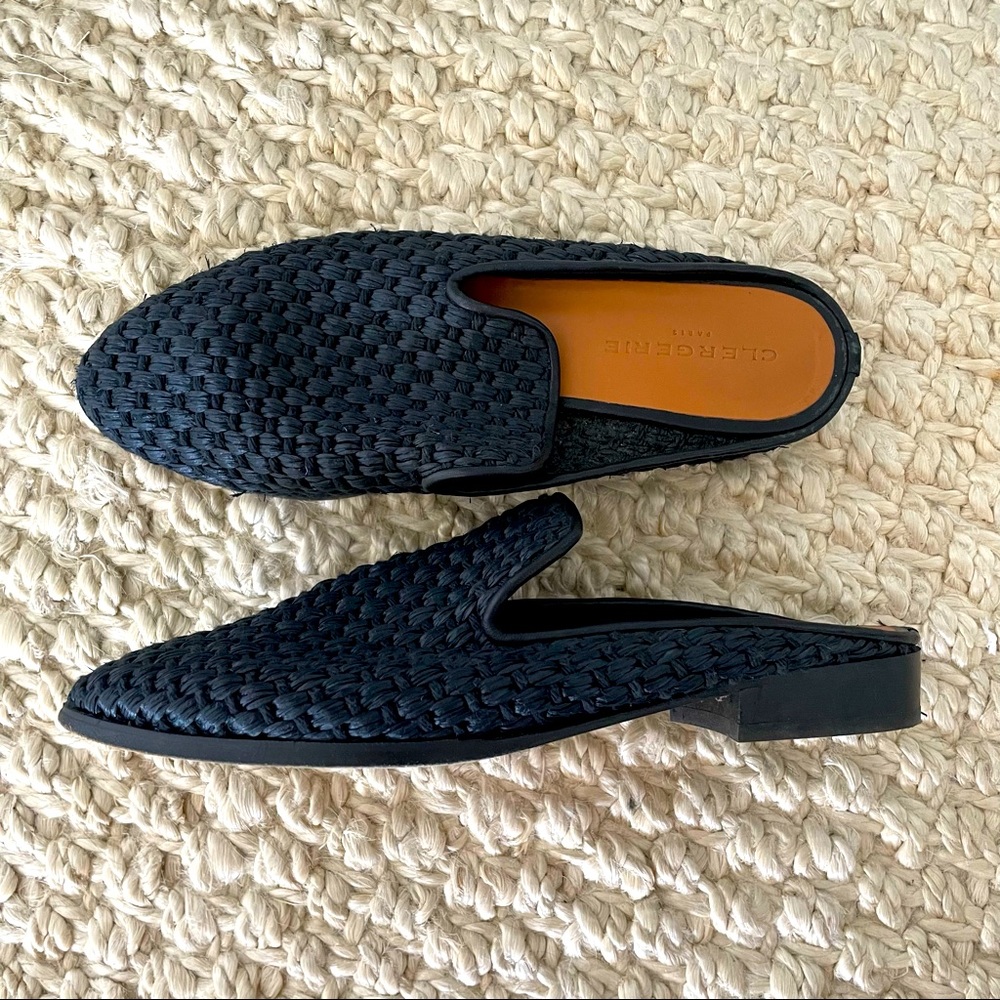 Robert Clergerie round-toe mules with leather trim at tops and stacked heels.